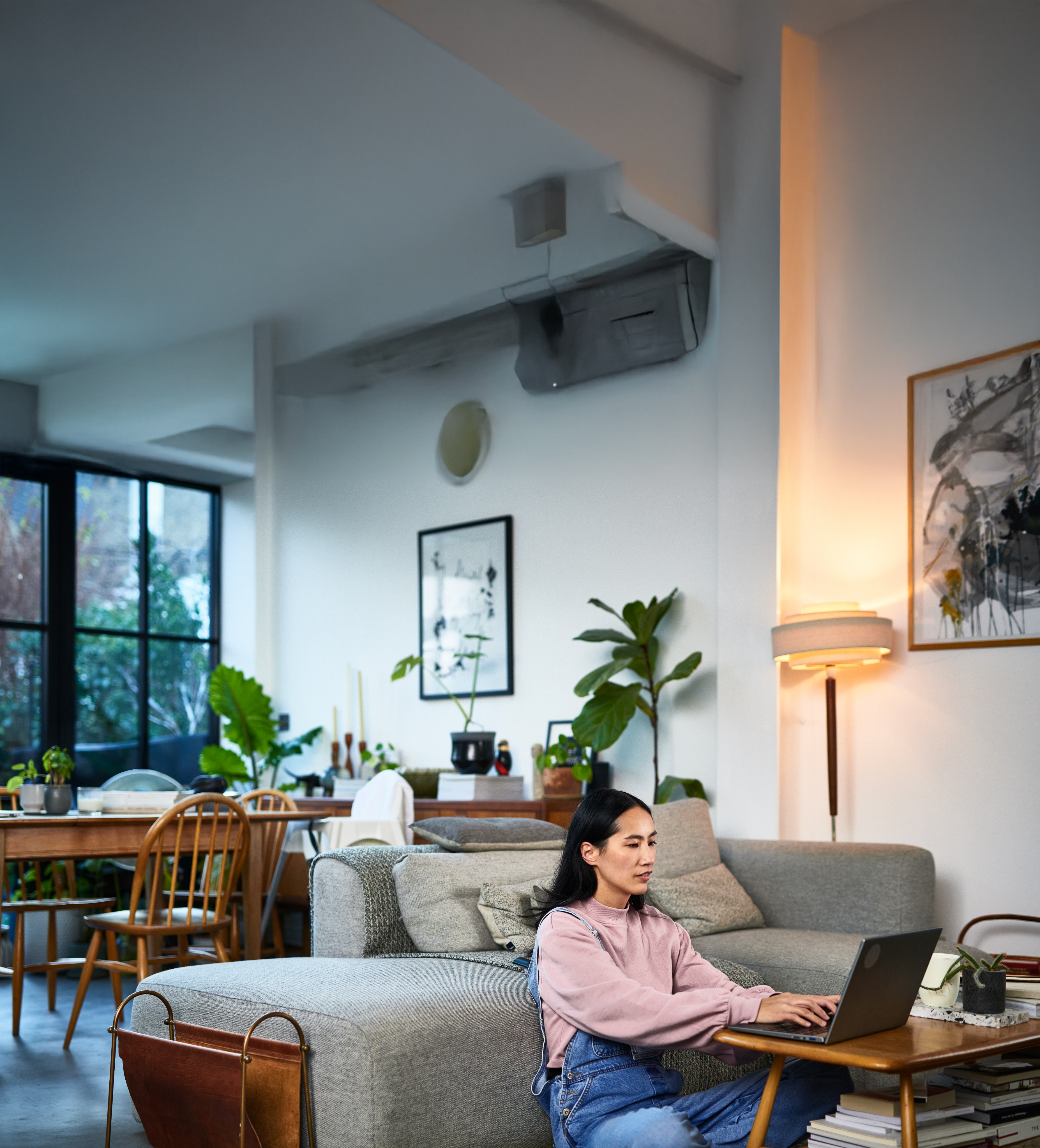 Woman using a tablet at home
